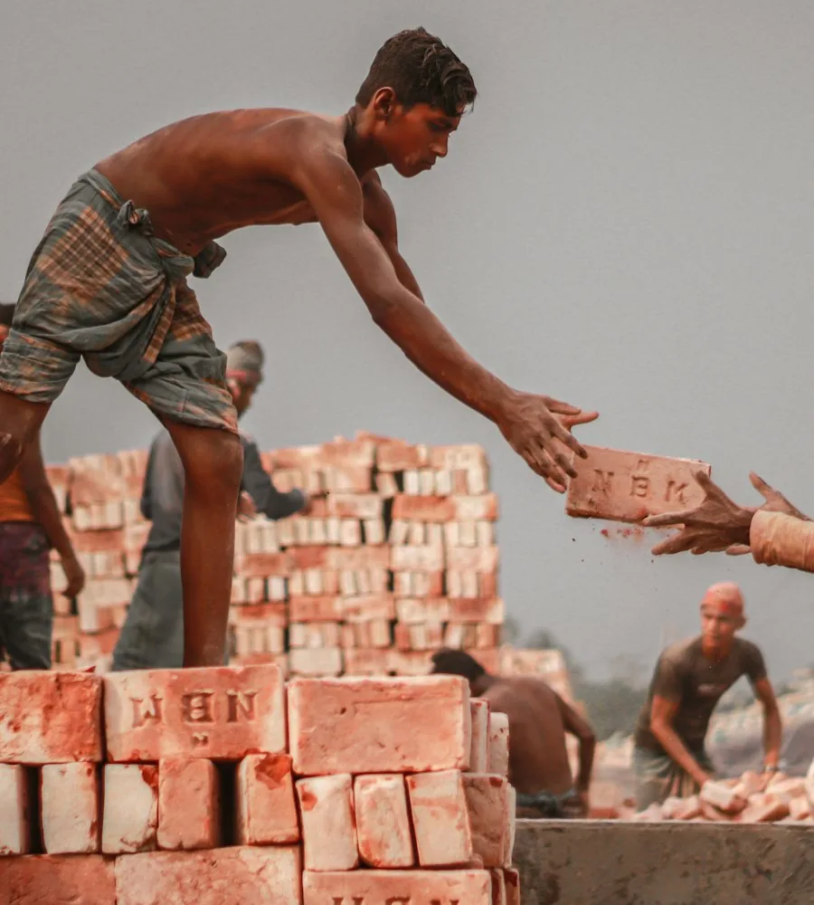 A day labourer in Dhaka at a brick kiln